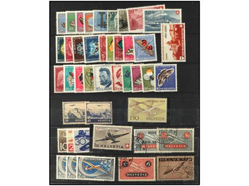 */° SUIZA. 5 Fichas conteniendo sellos y series de diversas 